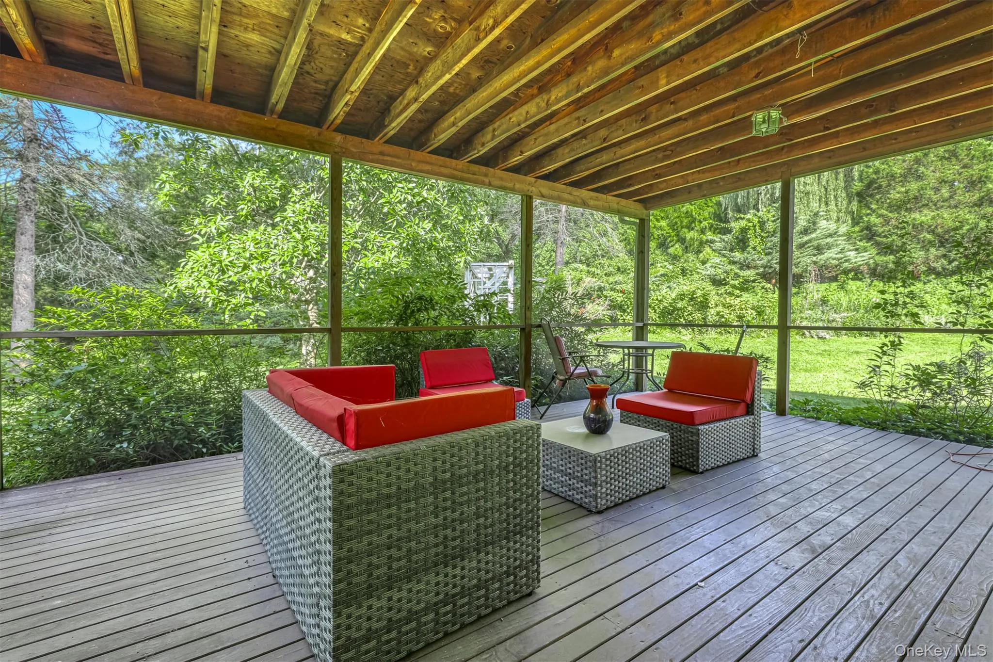 Wooden deck featuring an outdoor living space Wooden deck featuring an outdoor living space