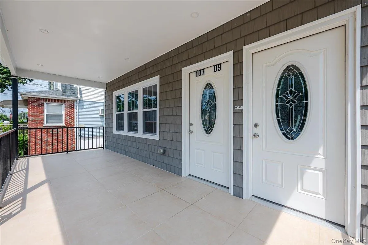 Property entrance featuring a porch Property entrance featuring a porch