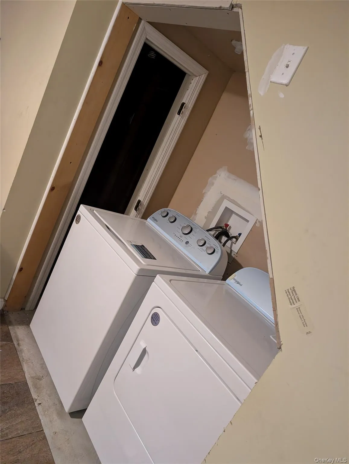 Laundry room featuring washer and dryer Laundry room featuring washer and dryer