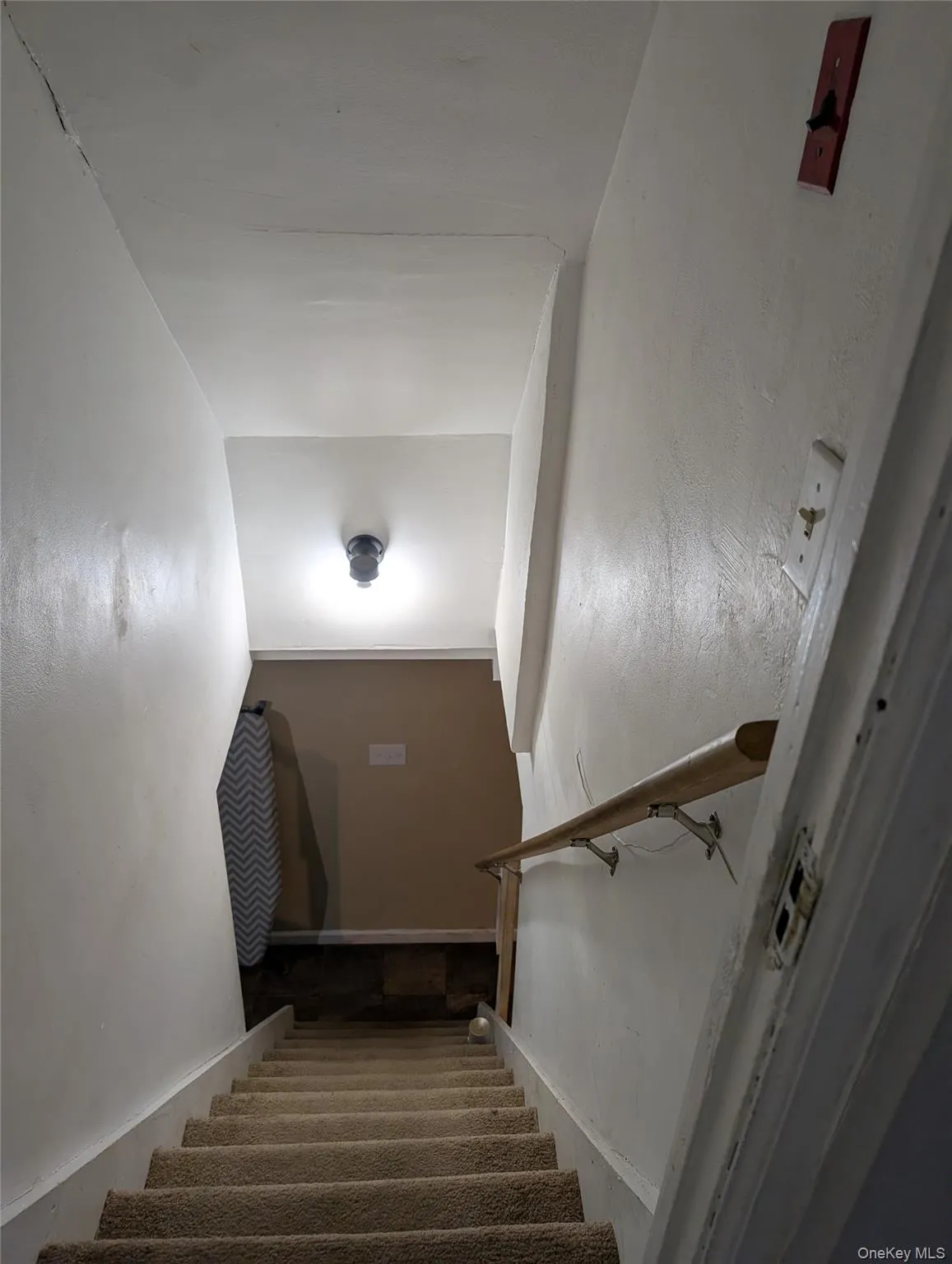 Stairs leading to the full basement Stairs leading to the full basement