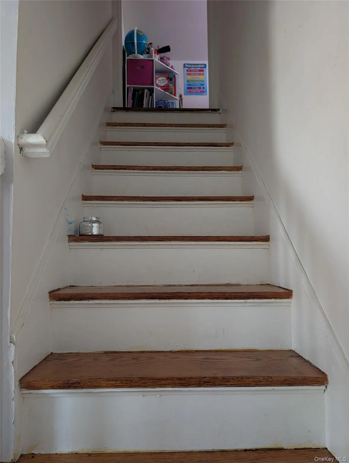 The stairs leading to the two upper level bedroom The stairs leading to the two upper level bedroom