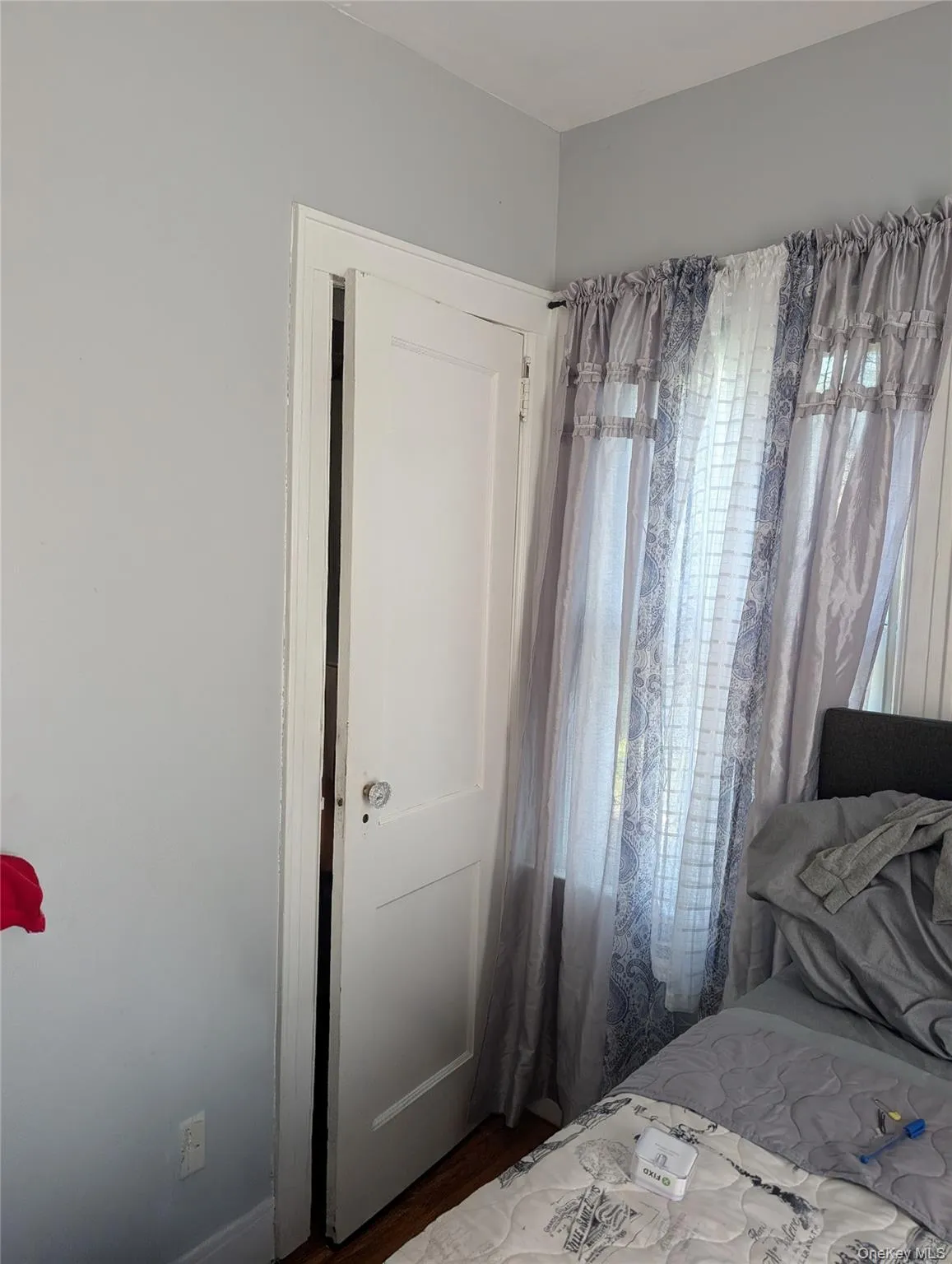 Bedroom with wood finished floors Bedroom with wood finished floors