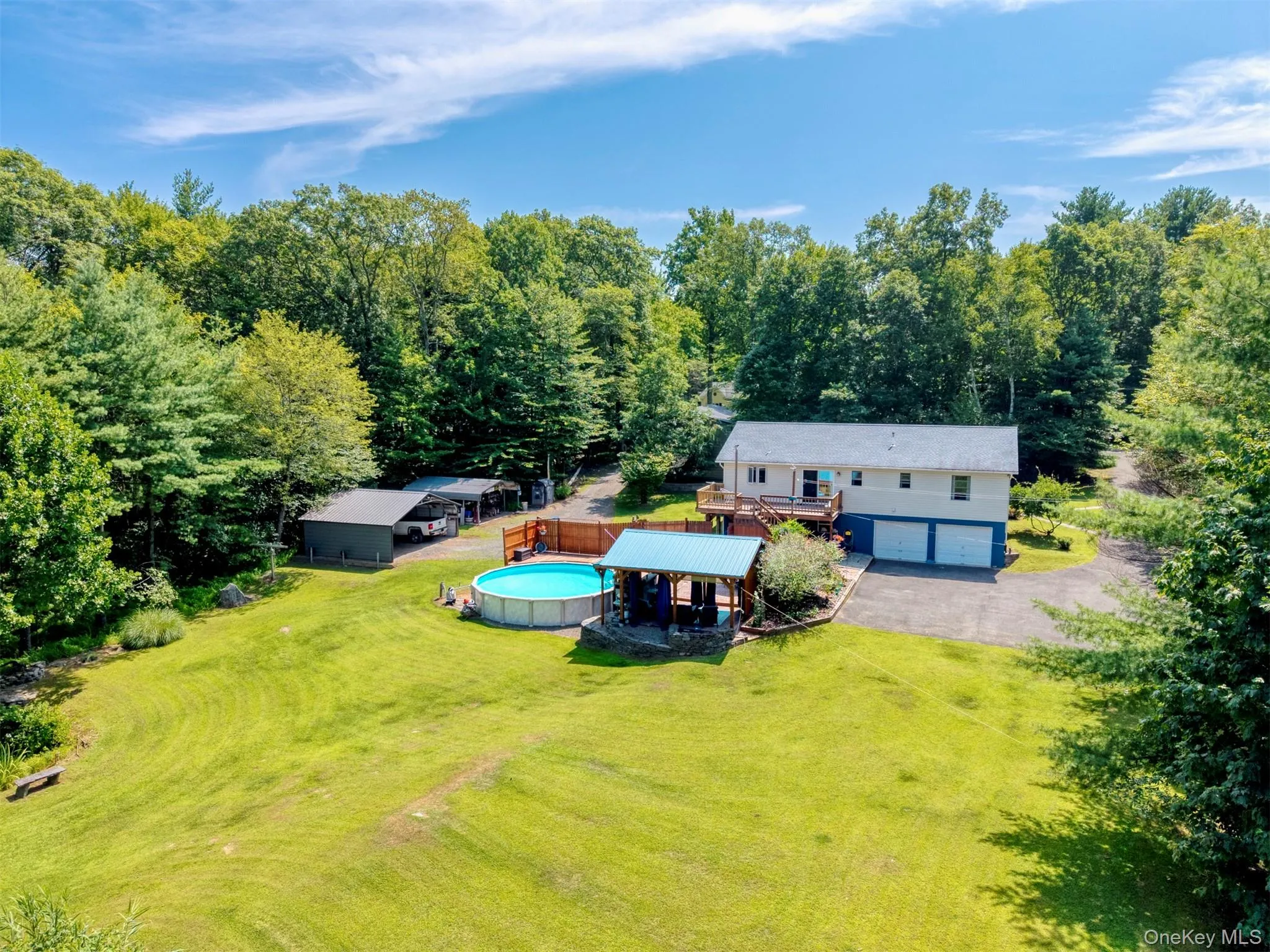 View of subject property with a pool View of subject property with a pool