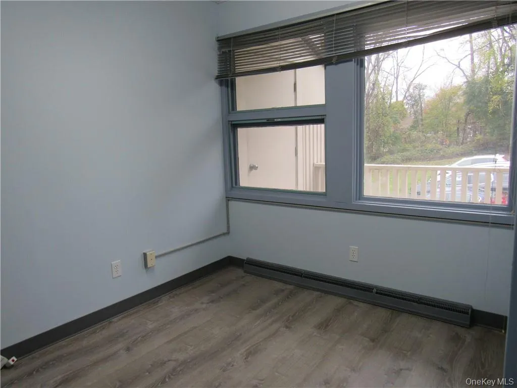 Private Office with large window. Private Office with large window.
