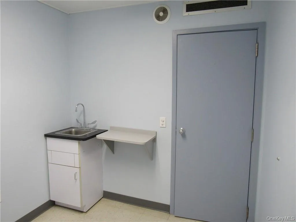 Exam Room 1 w/ sink Exam Room 1 w/ sink