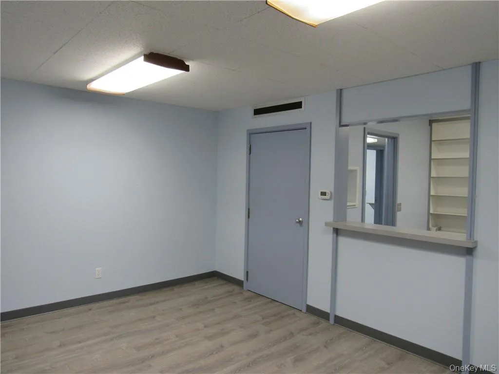 View of waiting room to receptionist area. View of waiting room to receptionist area.