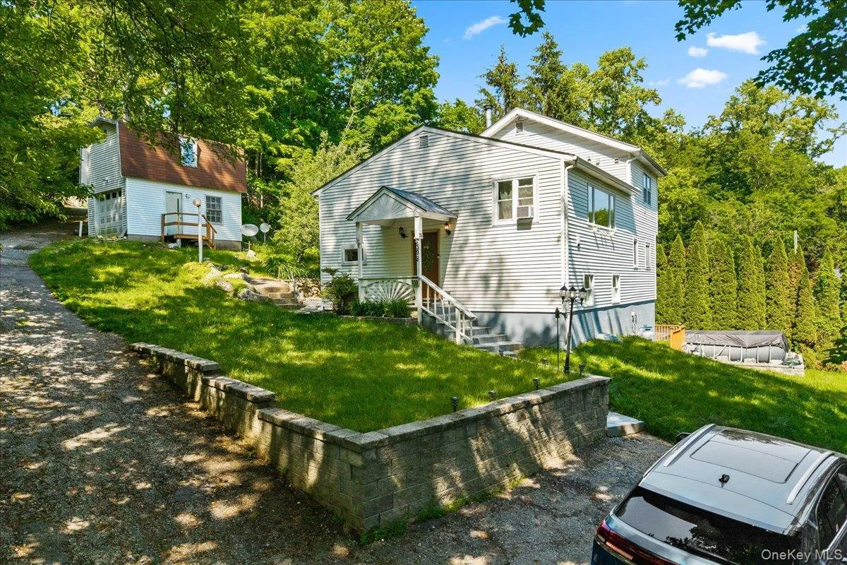 View of front of property with a front yard View of front of property with a front yard