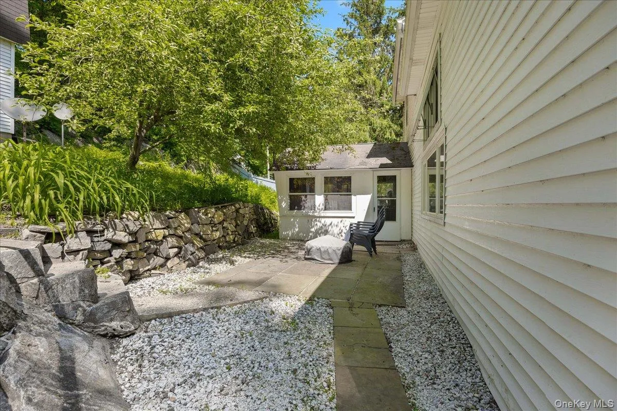 View of yard with a patio area View of yard with a patio area