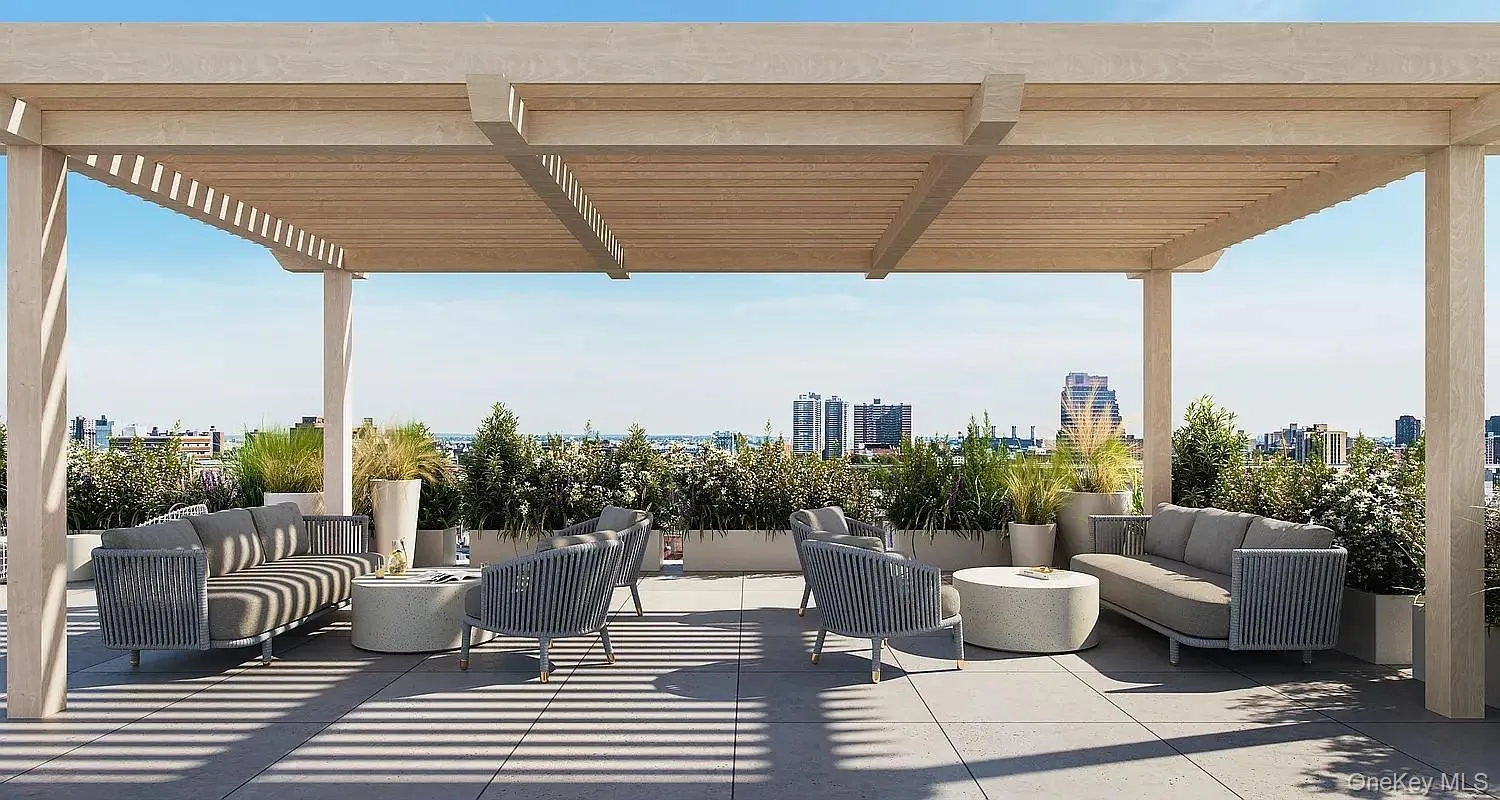 View of patio with an outdoor living space, a city view, and a pergola View of patio with an outdoor living space, a city view, and a pergola