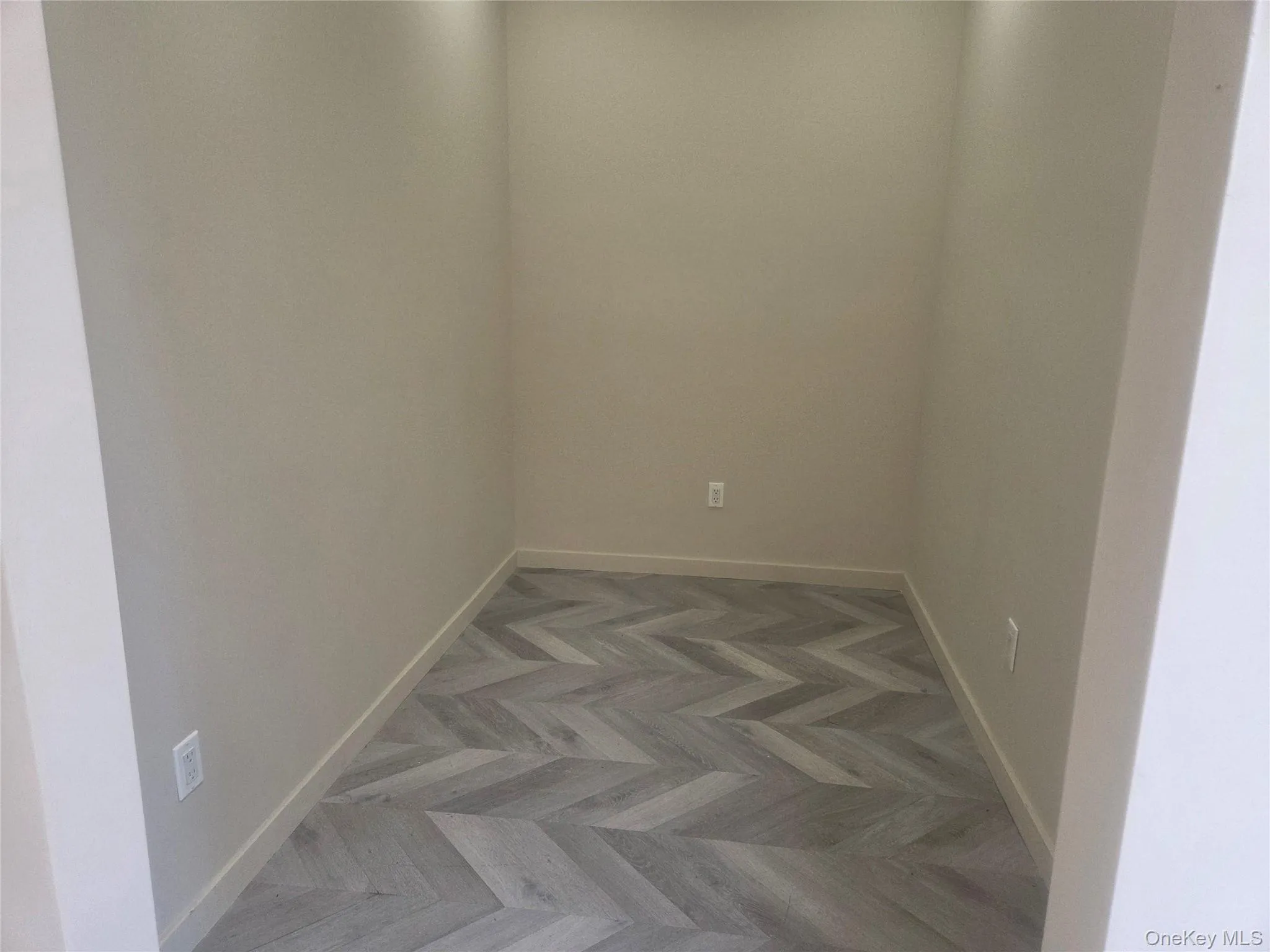 Spare room featuring baseboards Spare room featuring baseboards