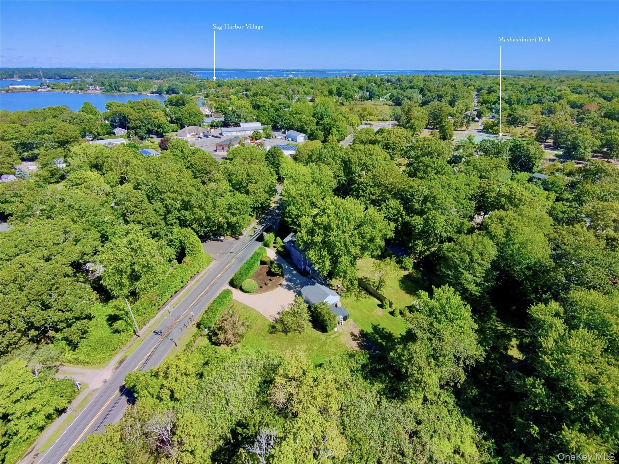 View of property location with a forest and a nearby body of water View of property location with a forest and a nearby body of water