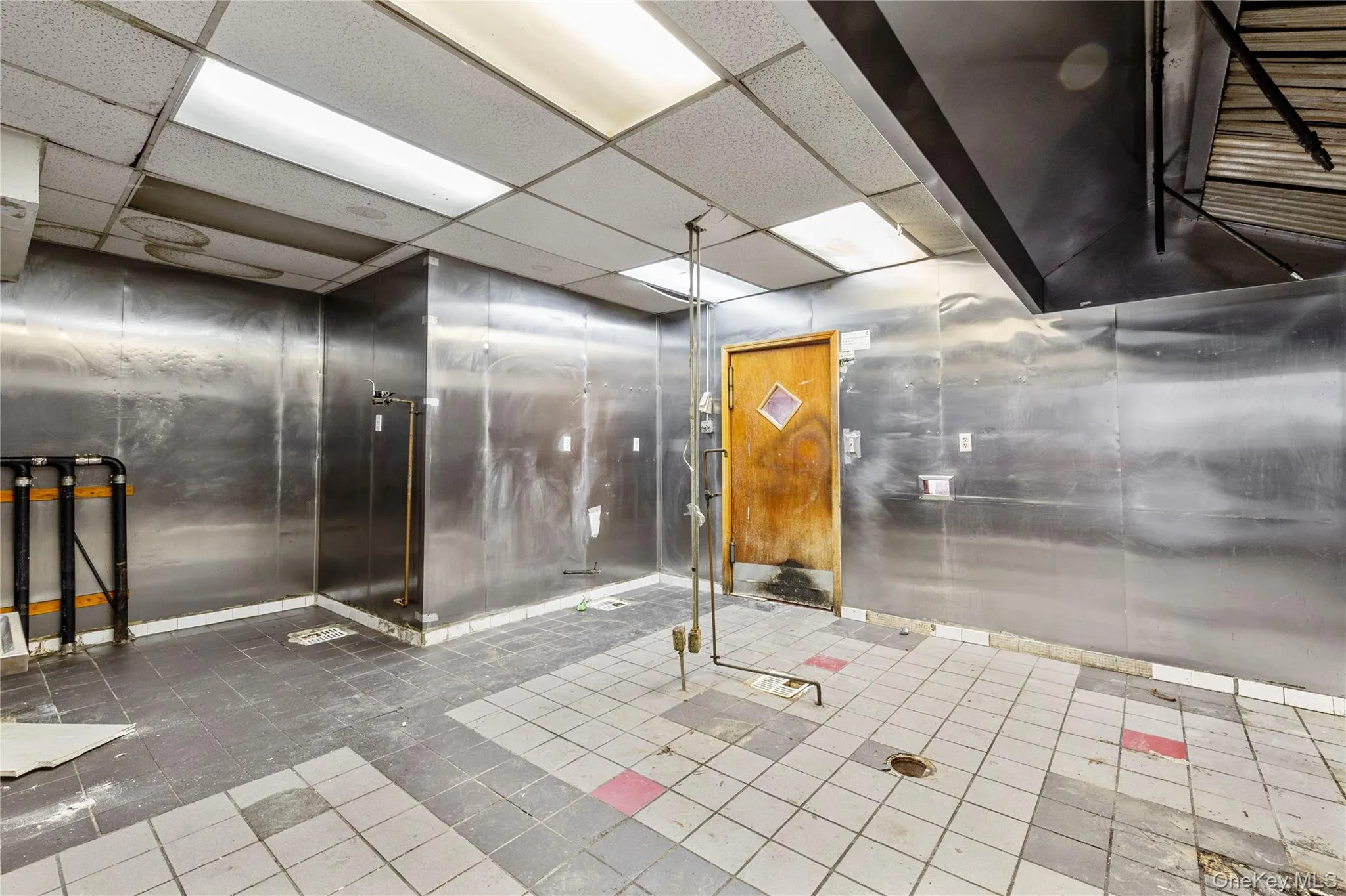 Common area featuring a drop ceiling Common area featuring a drop ceiling