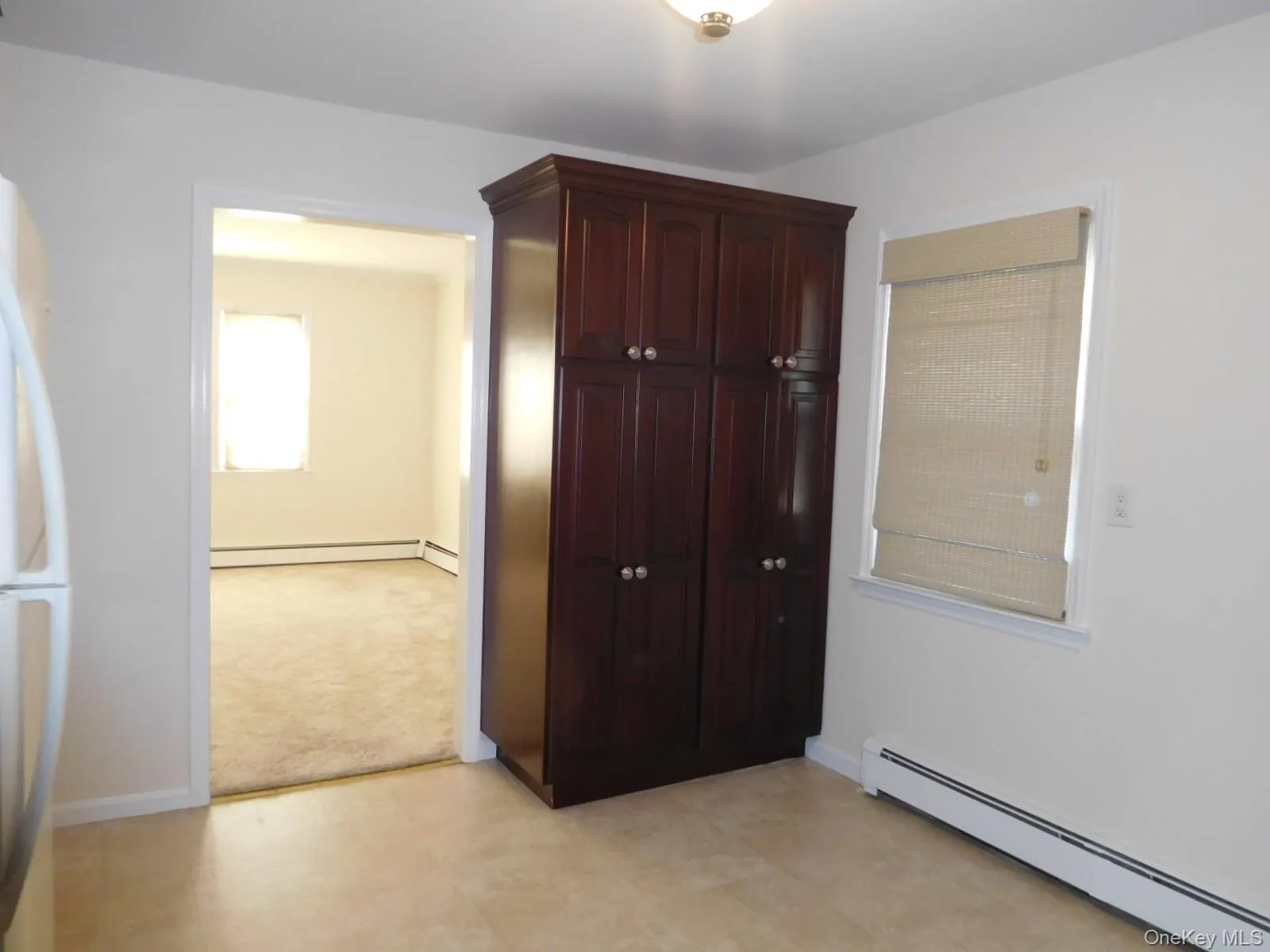 Extra Cabinetry in Kitchen w/view into Living Room Extra Cabinetry in Kitchen w/view into Living Room