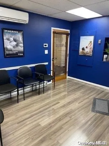 Community lobby featuring a paneled ceiling Community lobby featuring a paneled ceiling