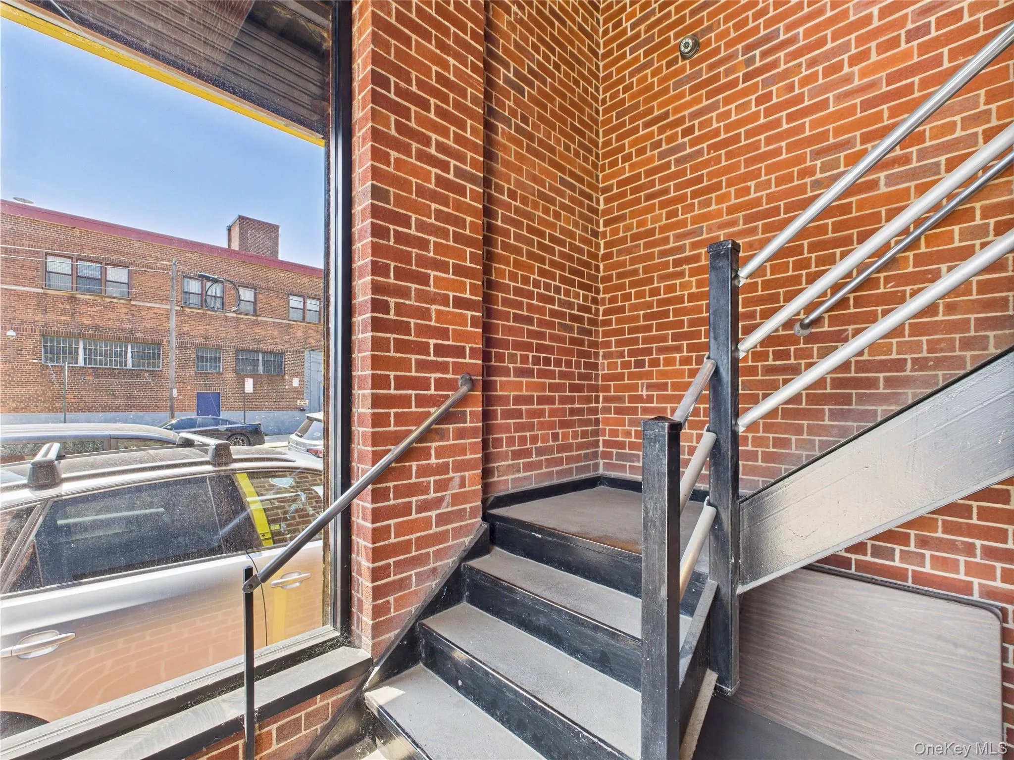 View of exterior entry featuring brick siding View of exterior entry featuring brick siding