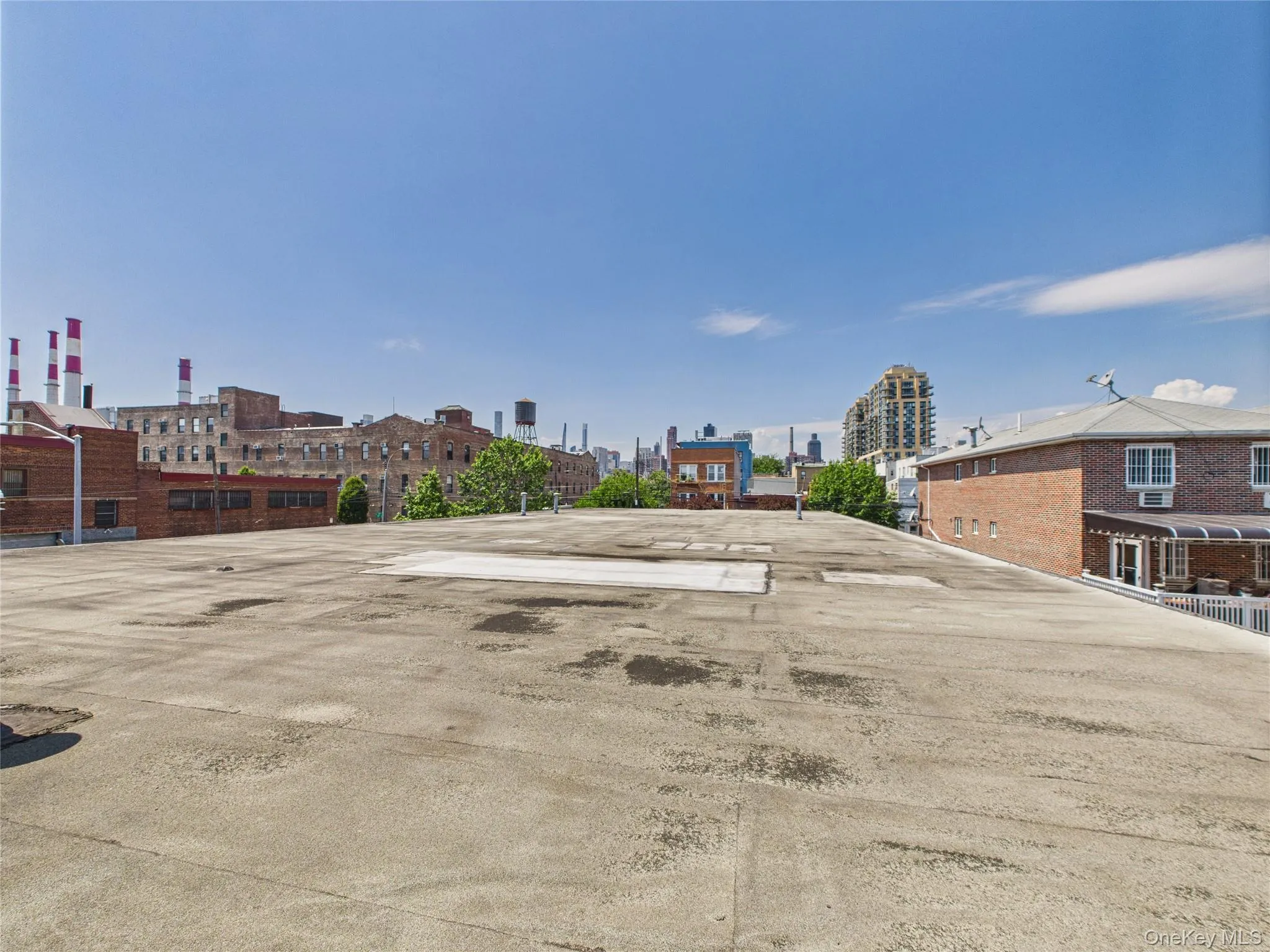 View of concrete road with a view of city View of concrete road with a view of city