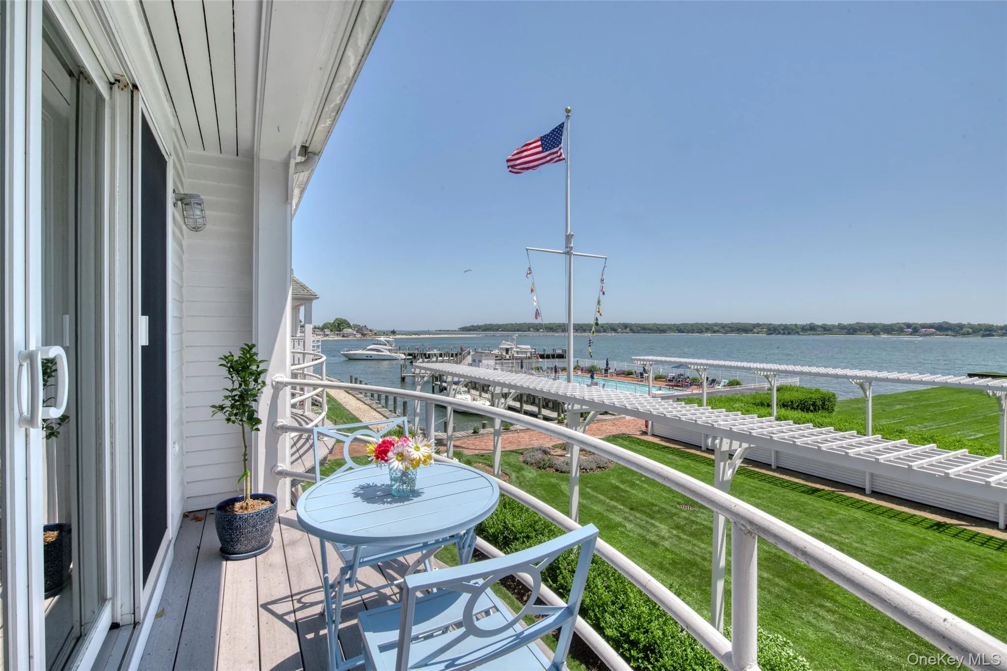 Balcony featuring a water view from Primary Bedroom Balcony featuring a water view from Primary Bedroom