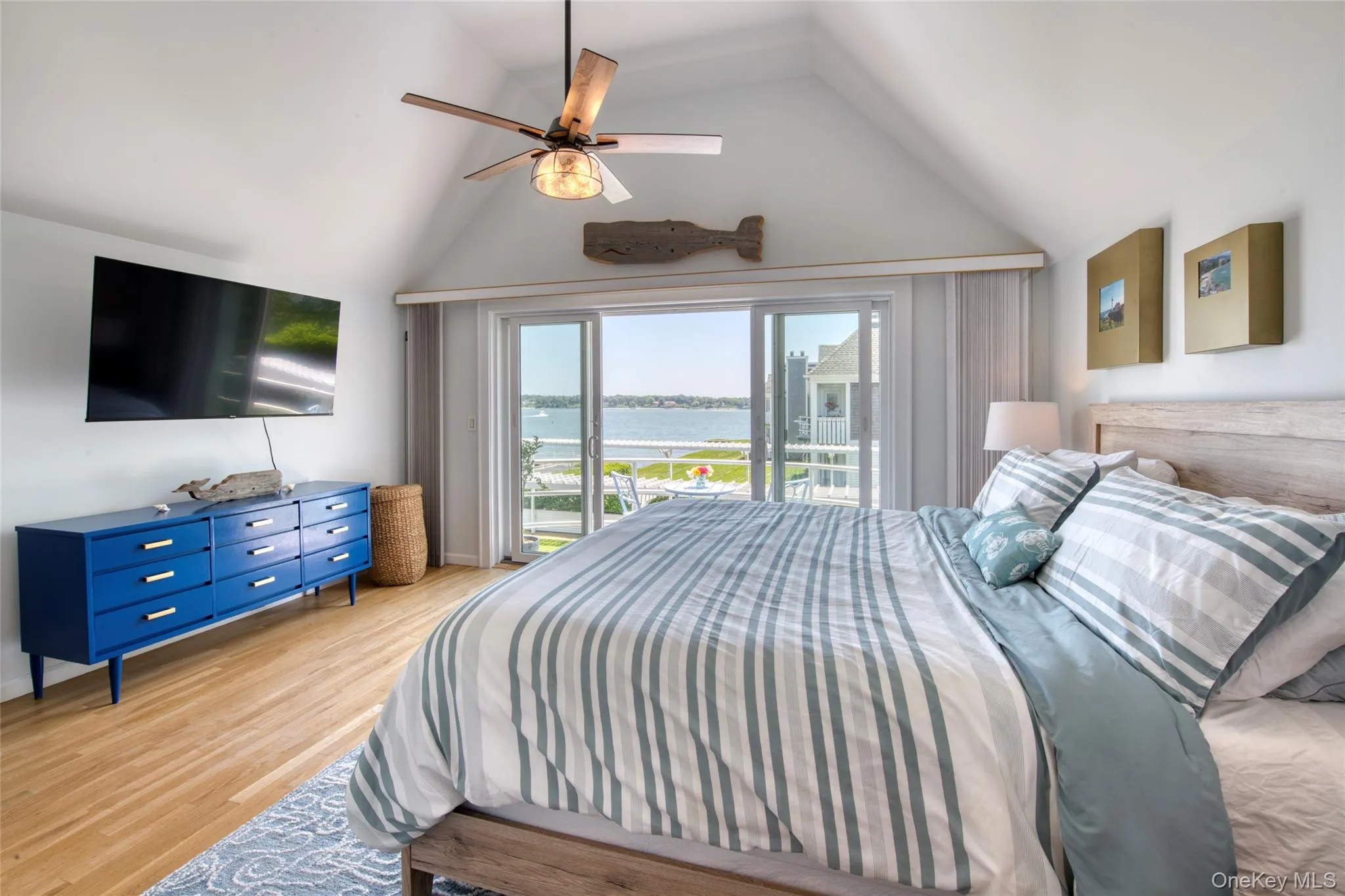 Bedroom featuring access to outside balcony Bedroom featuring access to outside balcony