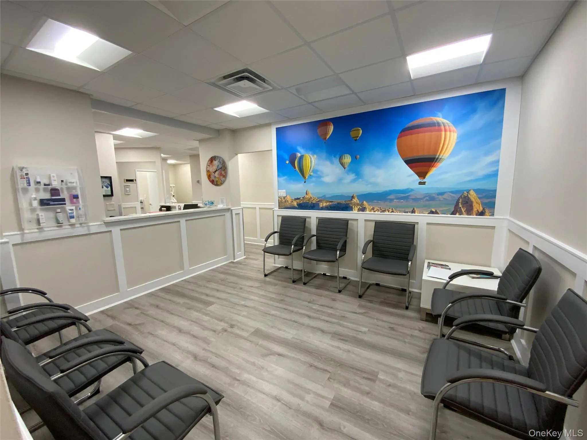 Reception area featuring a mountain view and a drop ceiling Reception area featuring a mountain view and a drop ceiling
