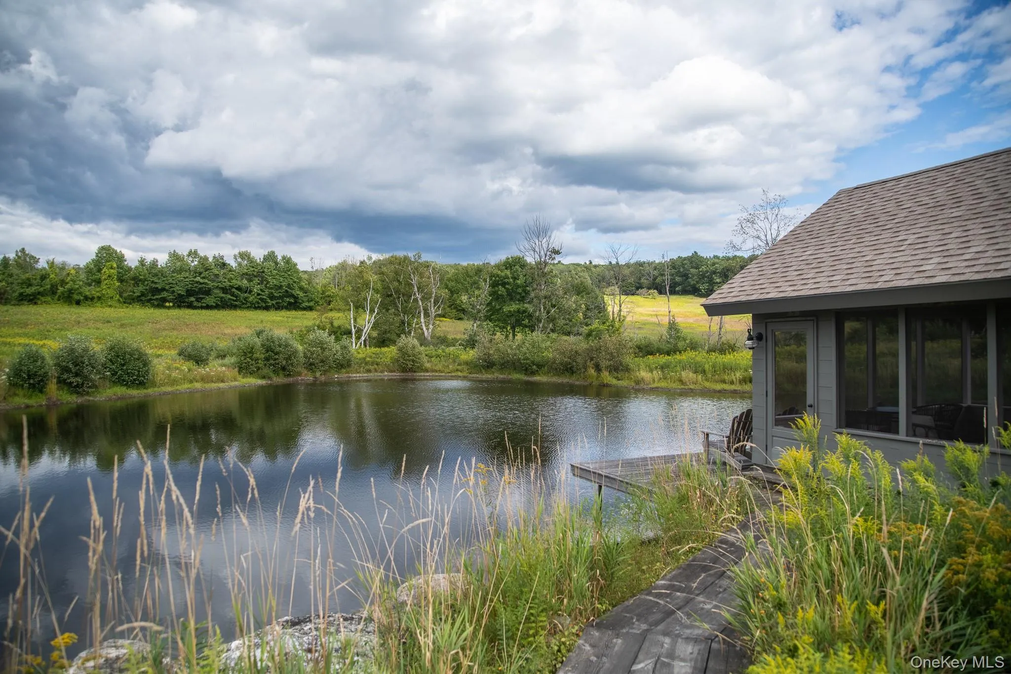 Screened porch with beautiful views Screened porch with beautiful views