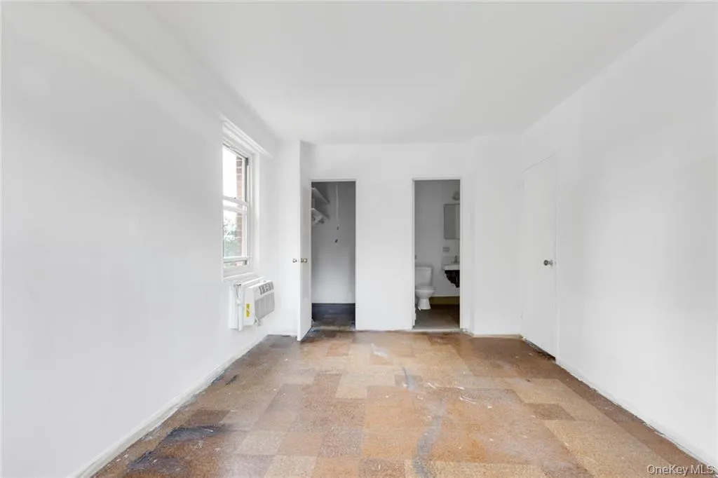 Spare room featuring baseboards Spare room featuring baseboards
