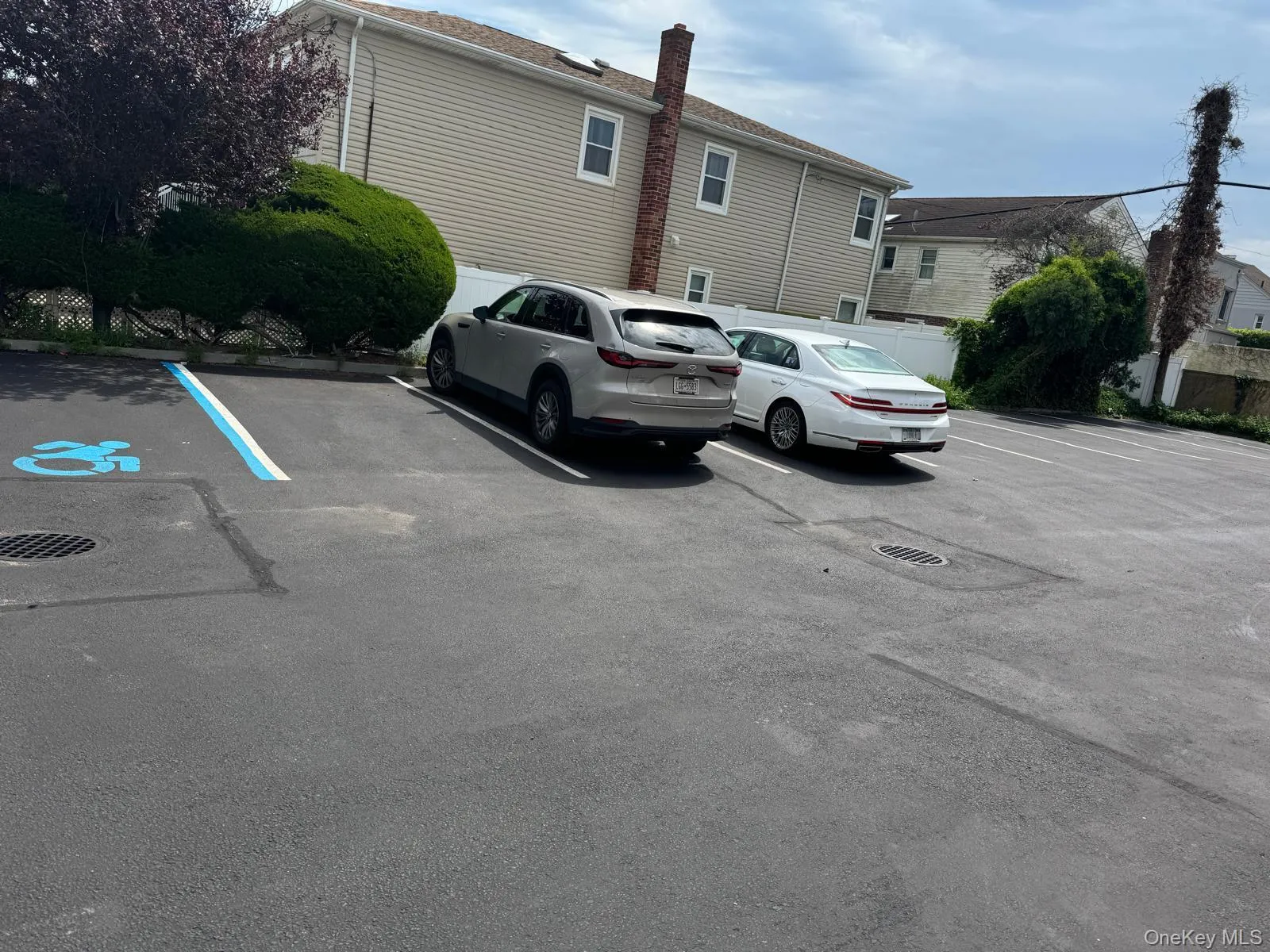 View of uncovered parking lot View of uncovered parking lot