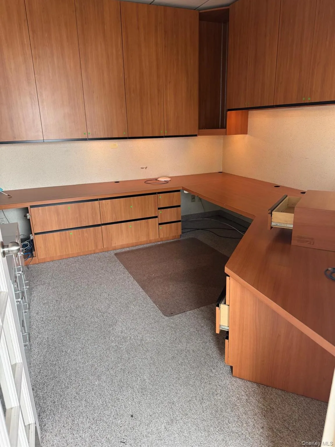 Office space with light colored carpet Office space with light colored carpet