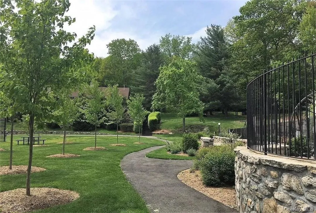 Surrounding community featuring a lawn Surrounding community featuring a lawn