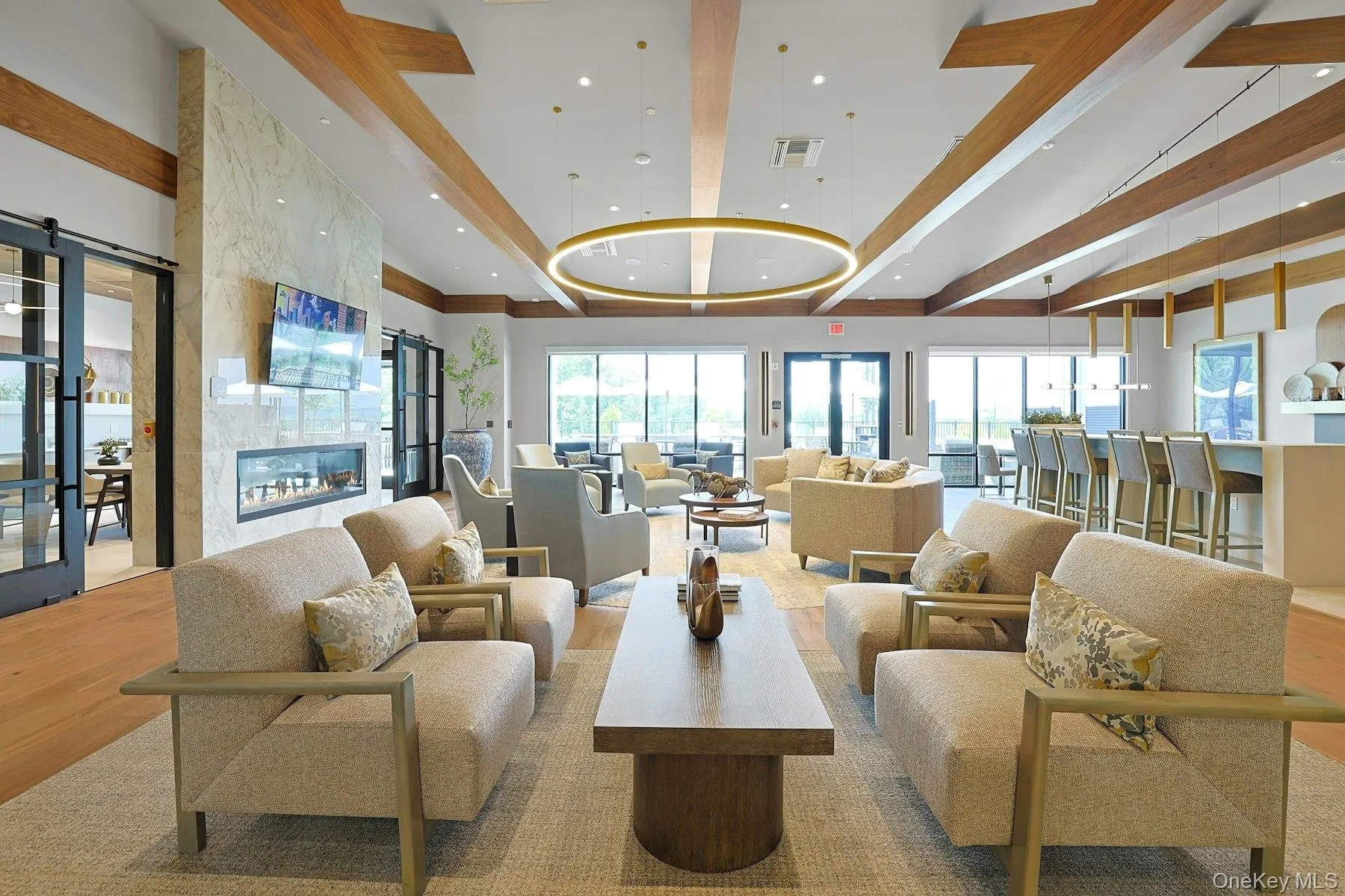 Clubroom featuring beam ceiling, recessed lighting, and high vaulted ceiling Clubroom featuring beam ceiling, recessed lighting, and high vaulted ceiling