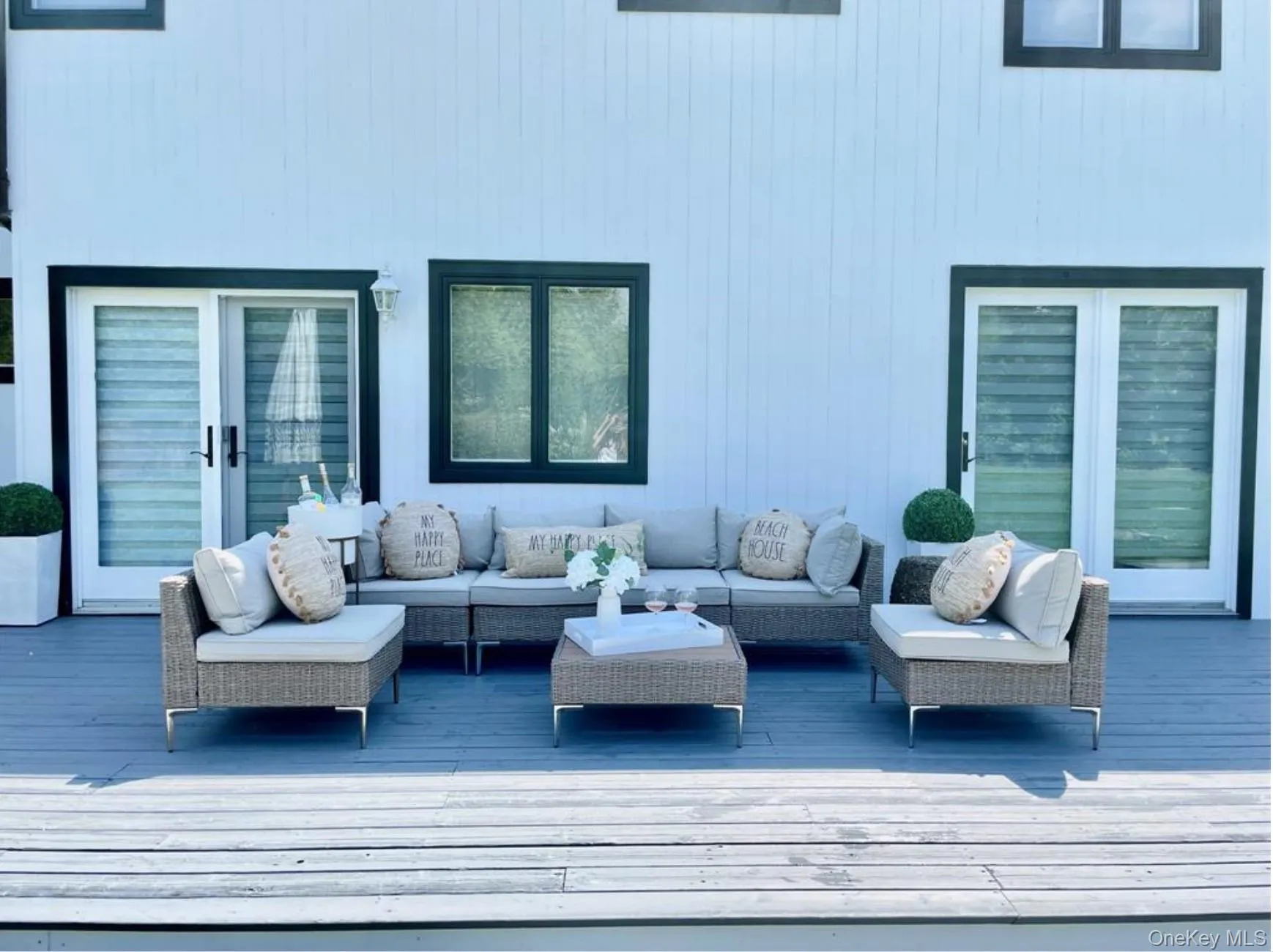 Deck with an outdoor hangout area Deck with an outdoor hangout area