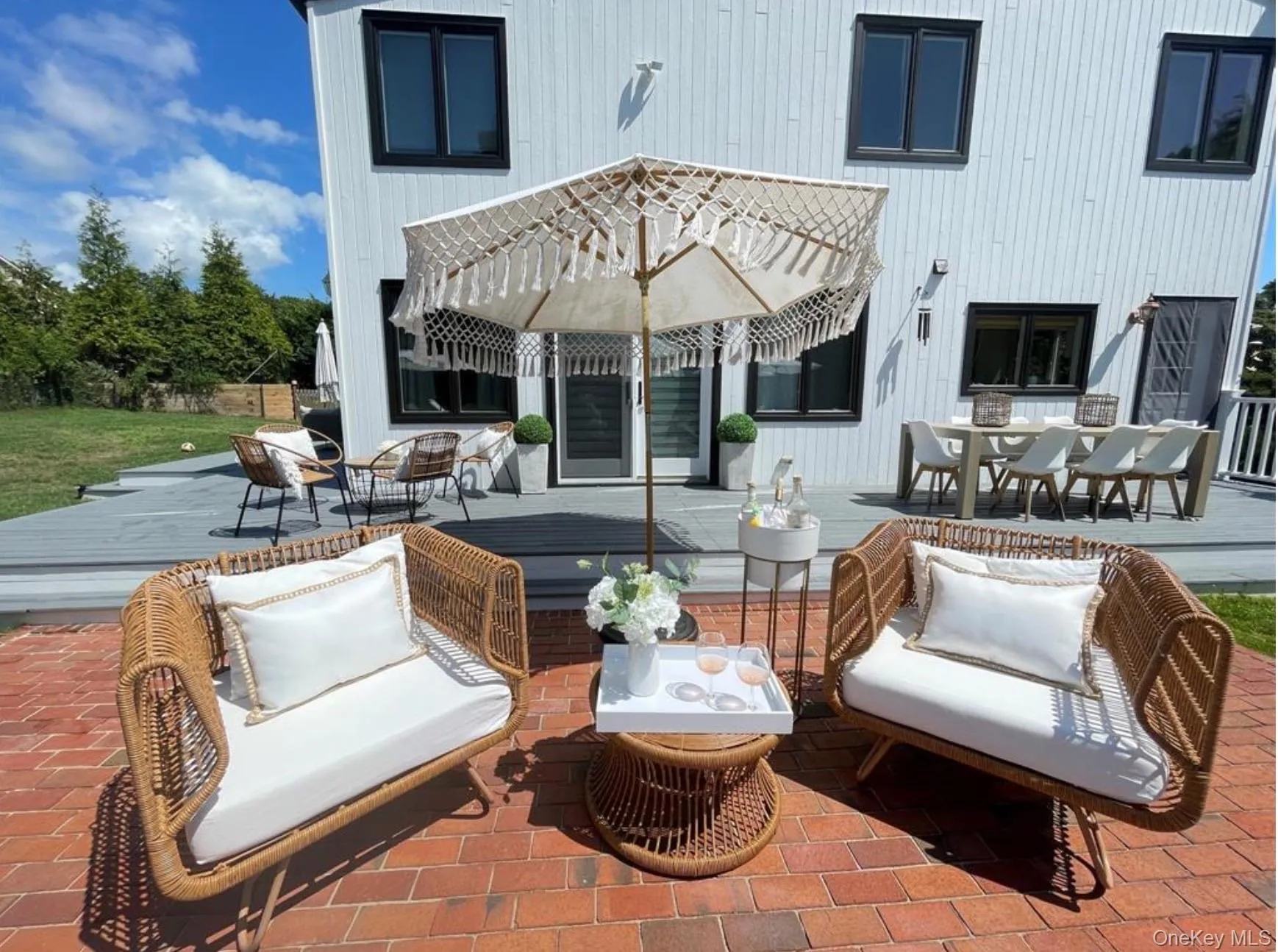 View of patio / terrace with outdoor dining area and an outdoor living space View of patio / terrace with outdoor dining area and an outdoor living space