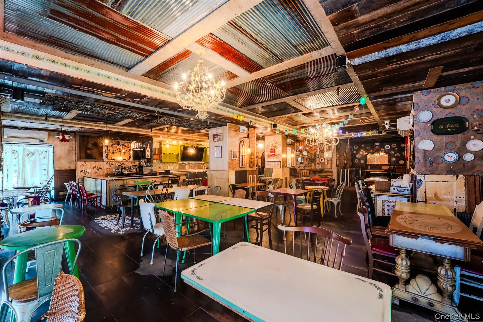 Rec room featuring a chandelier and wainscoting Rec room featuring a chandelier and wainscoting