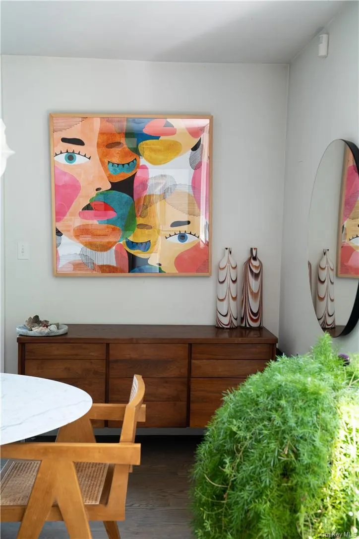Art wall with part of dining area and plant, and bar Art wall with part of dining area and plant, and bar