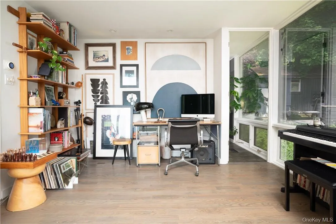 Office area featuring hardwood / wood-style floors Office area featuring hardwood / wood-style floors
