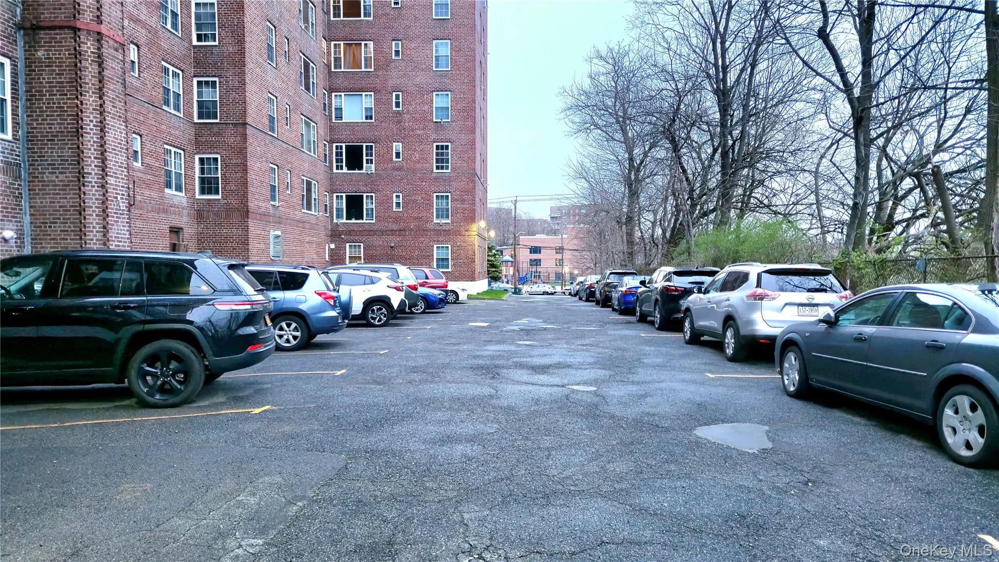View of uncovered parking lot View of uncovered parking lot