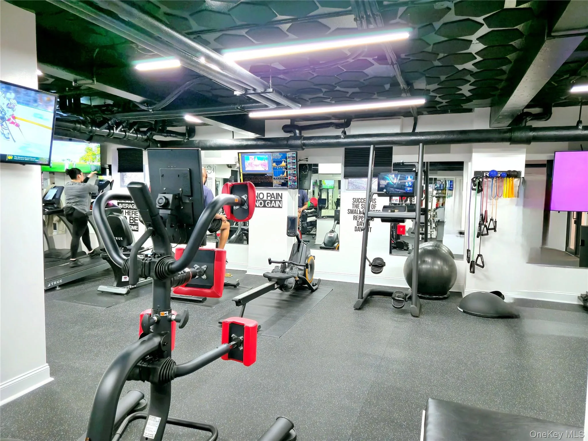 Gym featuring baseboards Gym featuring baseboards