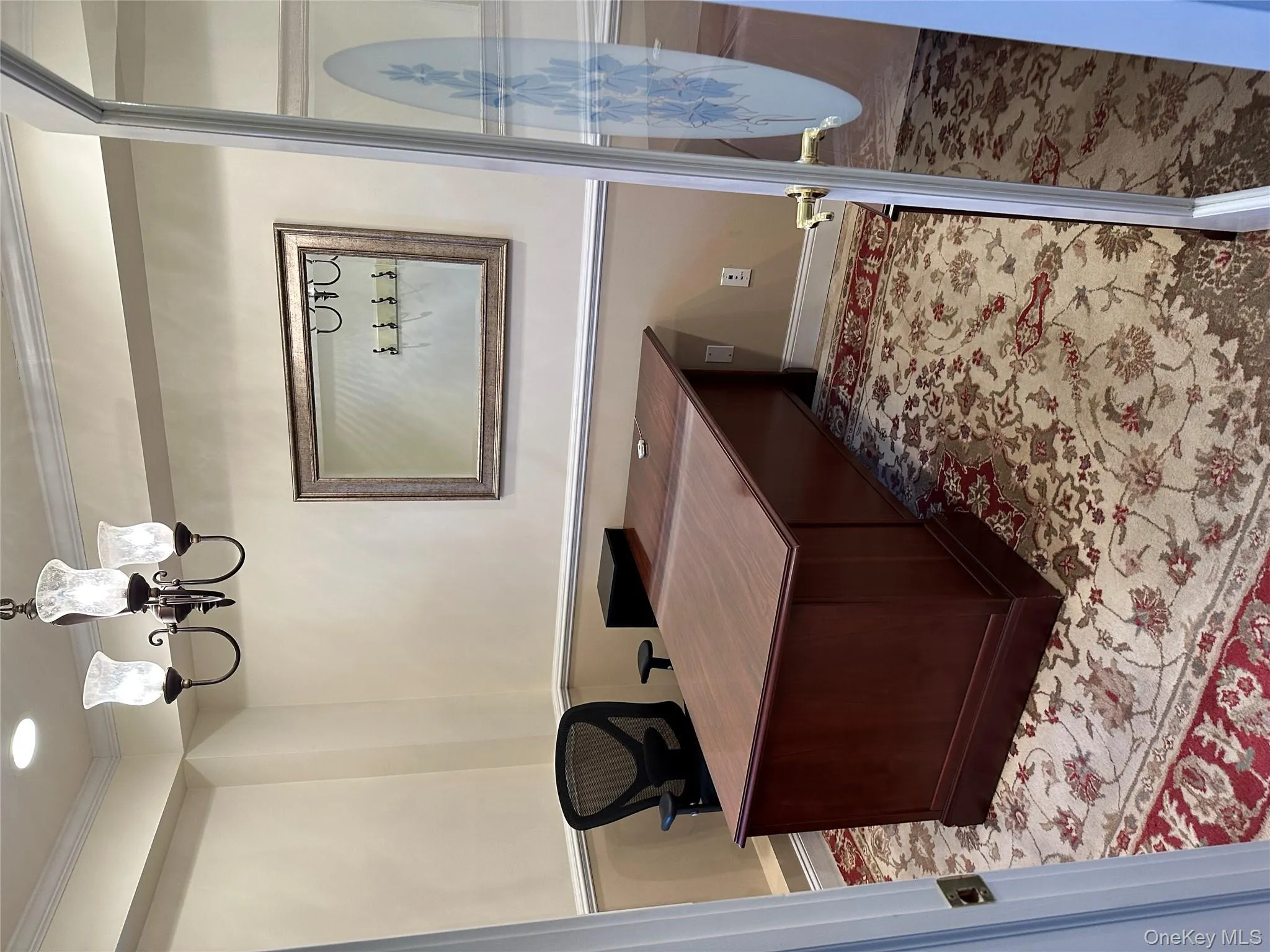 Office space with a chandelier, crown molding, and recessed lighting Office space with a chandelier, crown molding, and recessed lighting