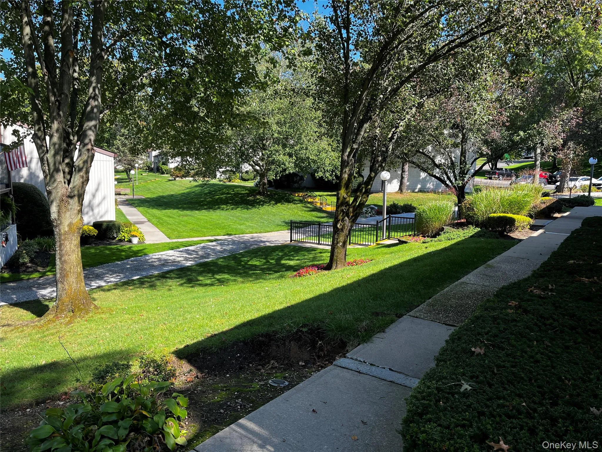 View of community featuring a lawn View of community featuring a lawn