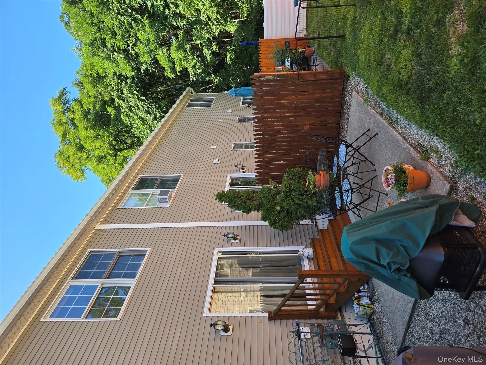 Back of property with a patio Back of property with a patio