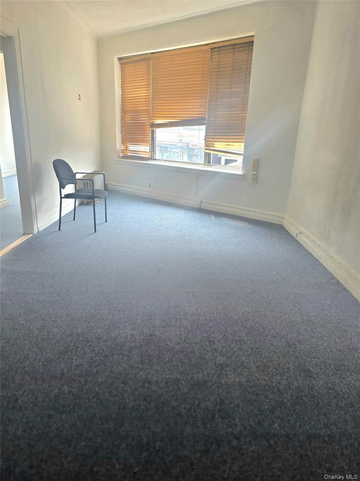 Unfurnished room with carpet flooring Unfurnished room with carpet flooring