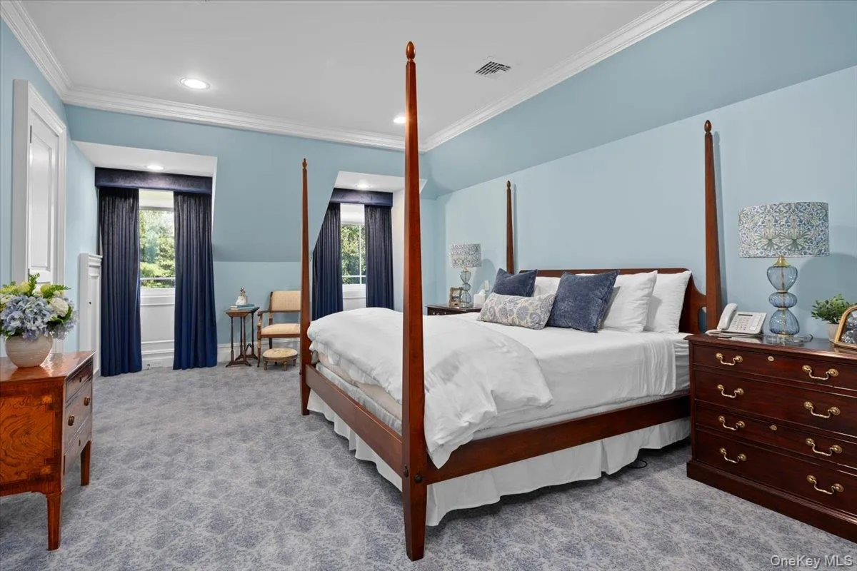 Bedroom featuring carpet flooring, crown molding, and recessed lighting Bedroom featuring carpet flooring, crown molding, and recessed lighting