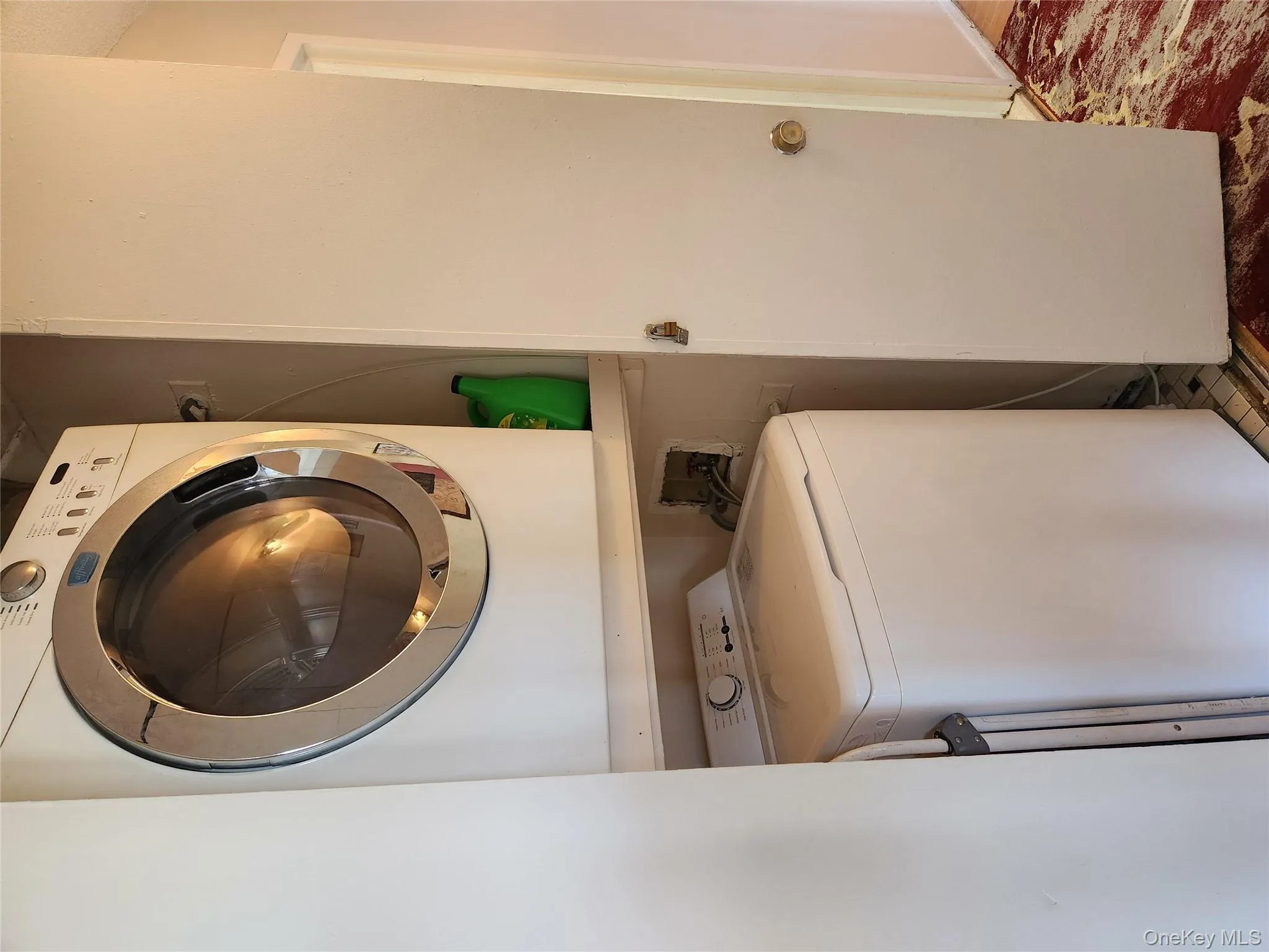 Washroom featuring estacked washer and dryer Washroom featuring estacked washer and dryer