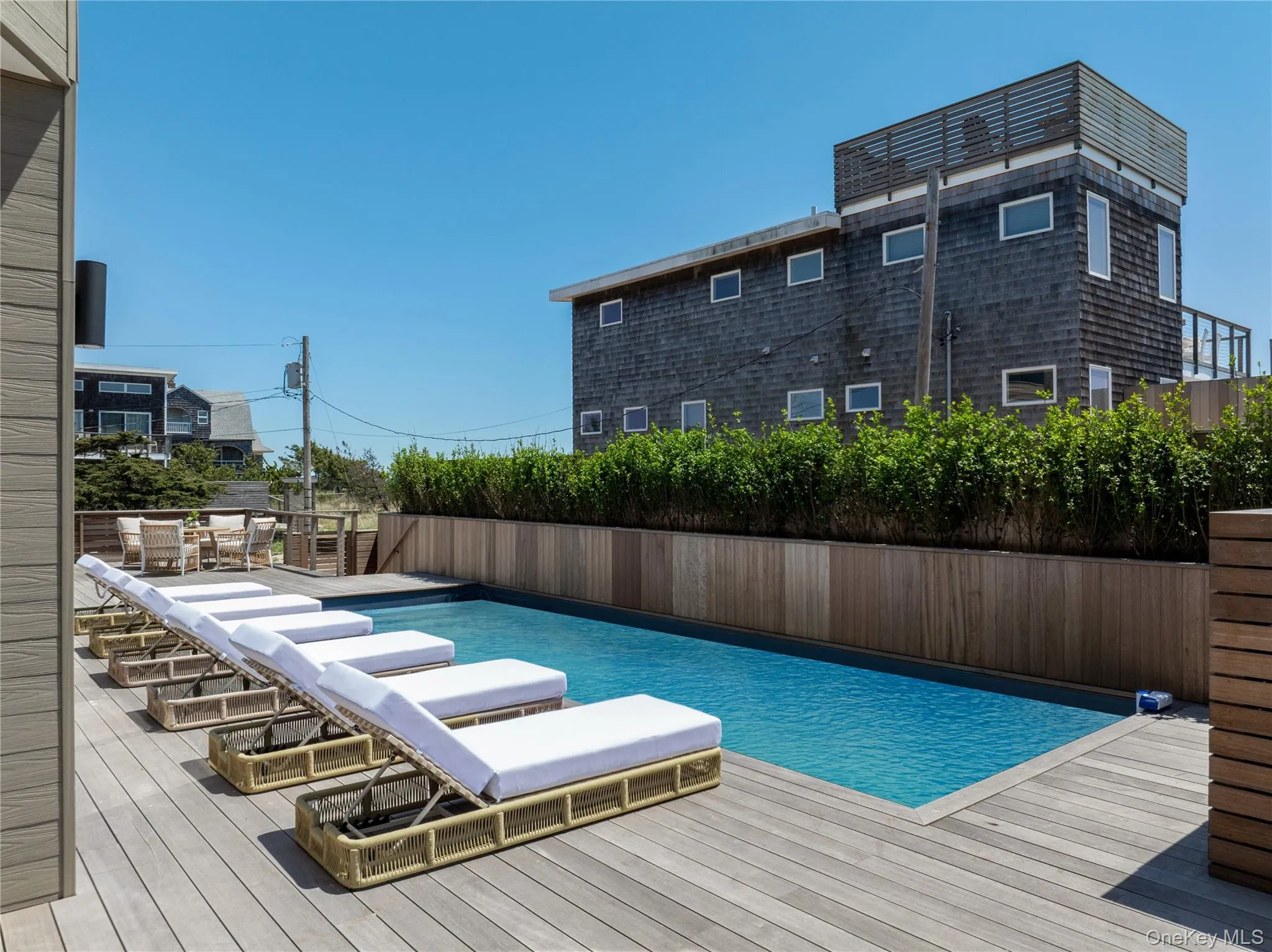 View of swimming pool featuring a deck View of swimming pool featuring a deck
