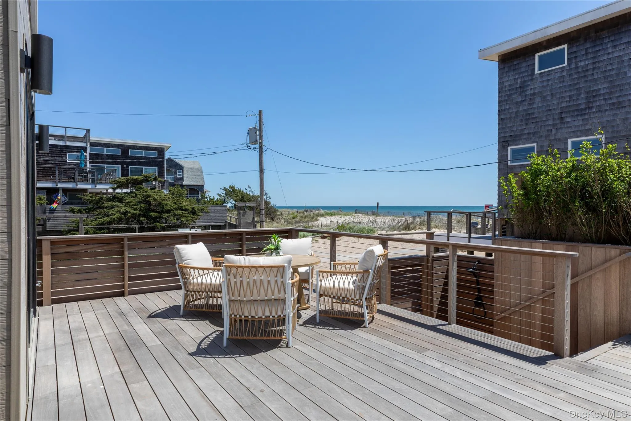 Wooden deck with a water view Wooden deck with a water view