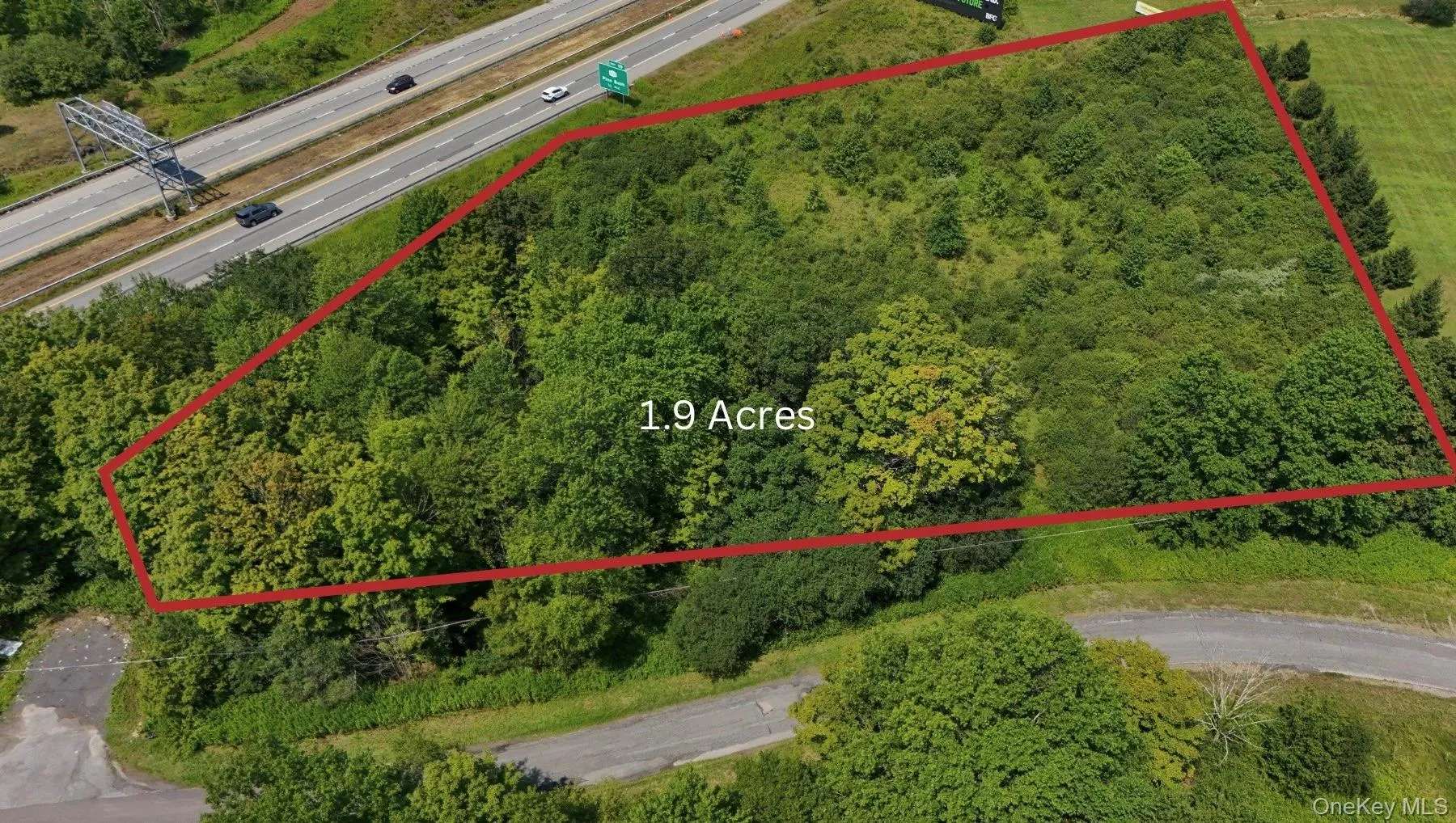 Aerial view of property from above with estimated parcel lines outlined Aerial view of property from above with estimated parcel lines outlined