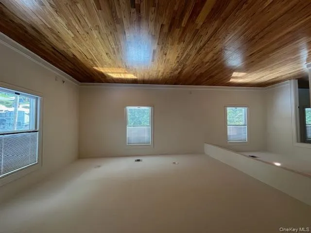 Spare room featuring light wood-style flooring Spare room featuring light wood-style flooring