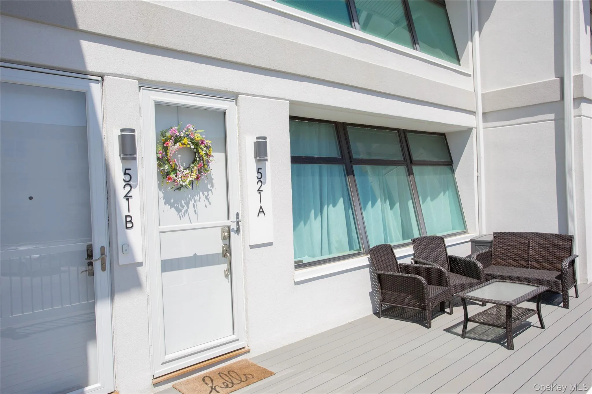 View of exterior entry featuring a deck View of exterior entry featuring a deck