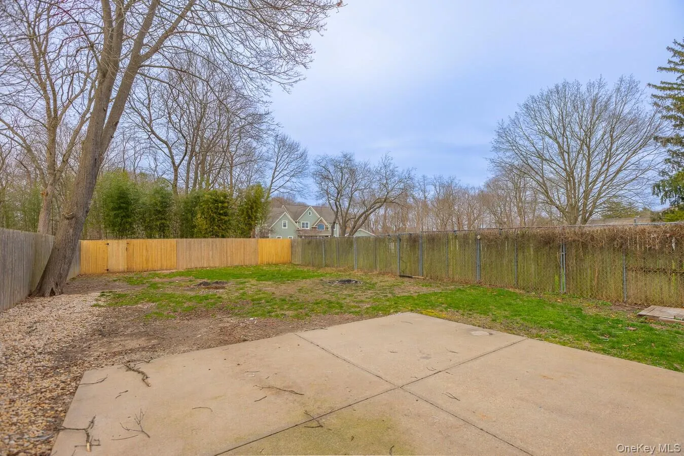 Fenced backyard featuring a patio area Fenced backyard featuring a patio area