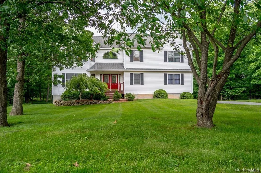 View of front of property with a front lawn View of front of property with a front lawn