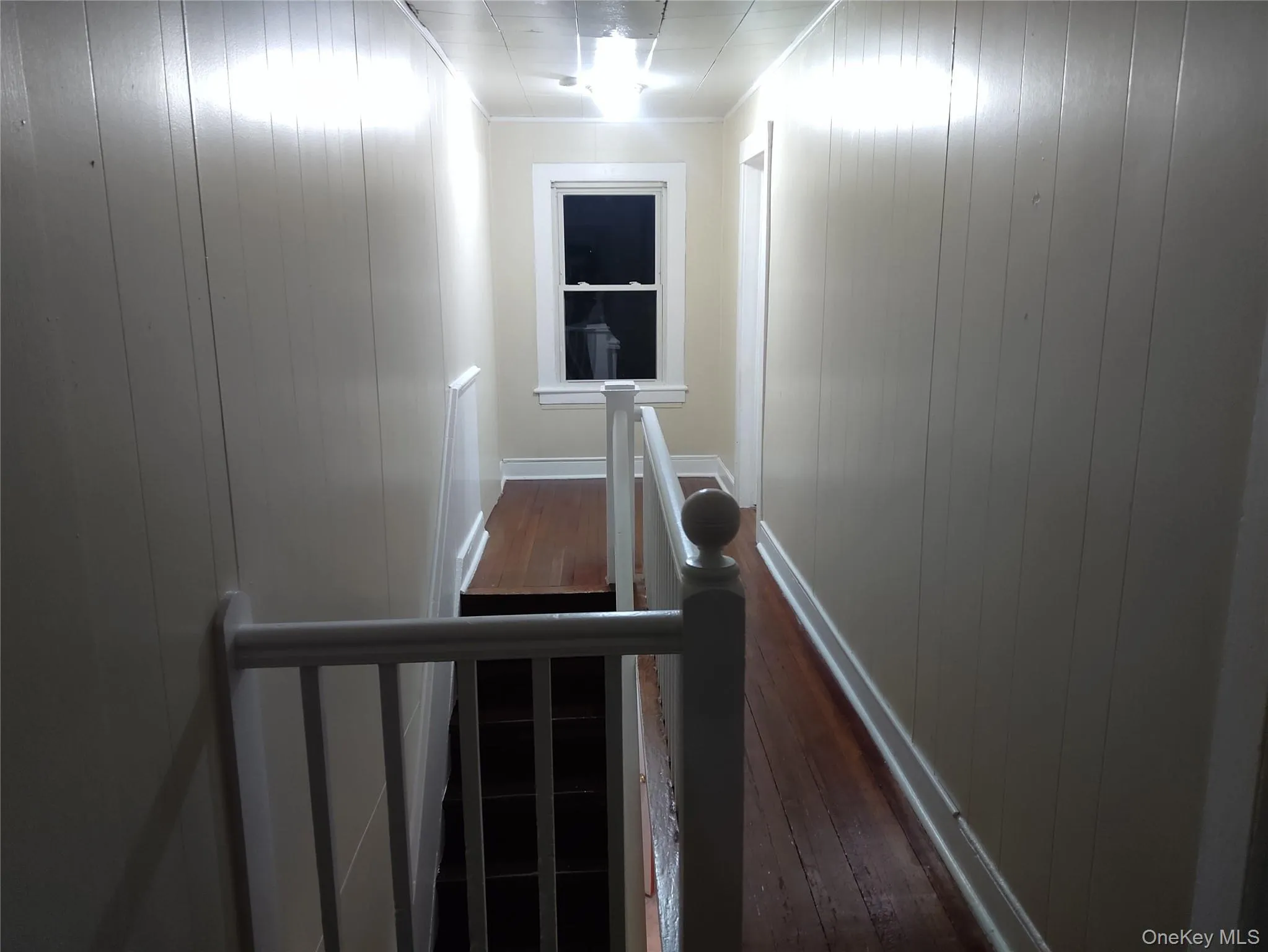 Stairs with wood walls and wood-type flooring Stairs with wood walls and wood-type flooring